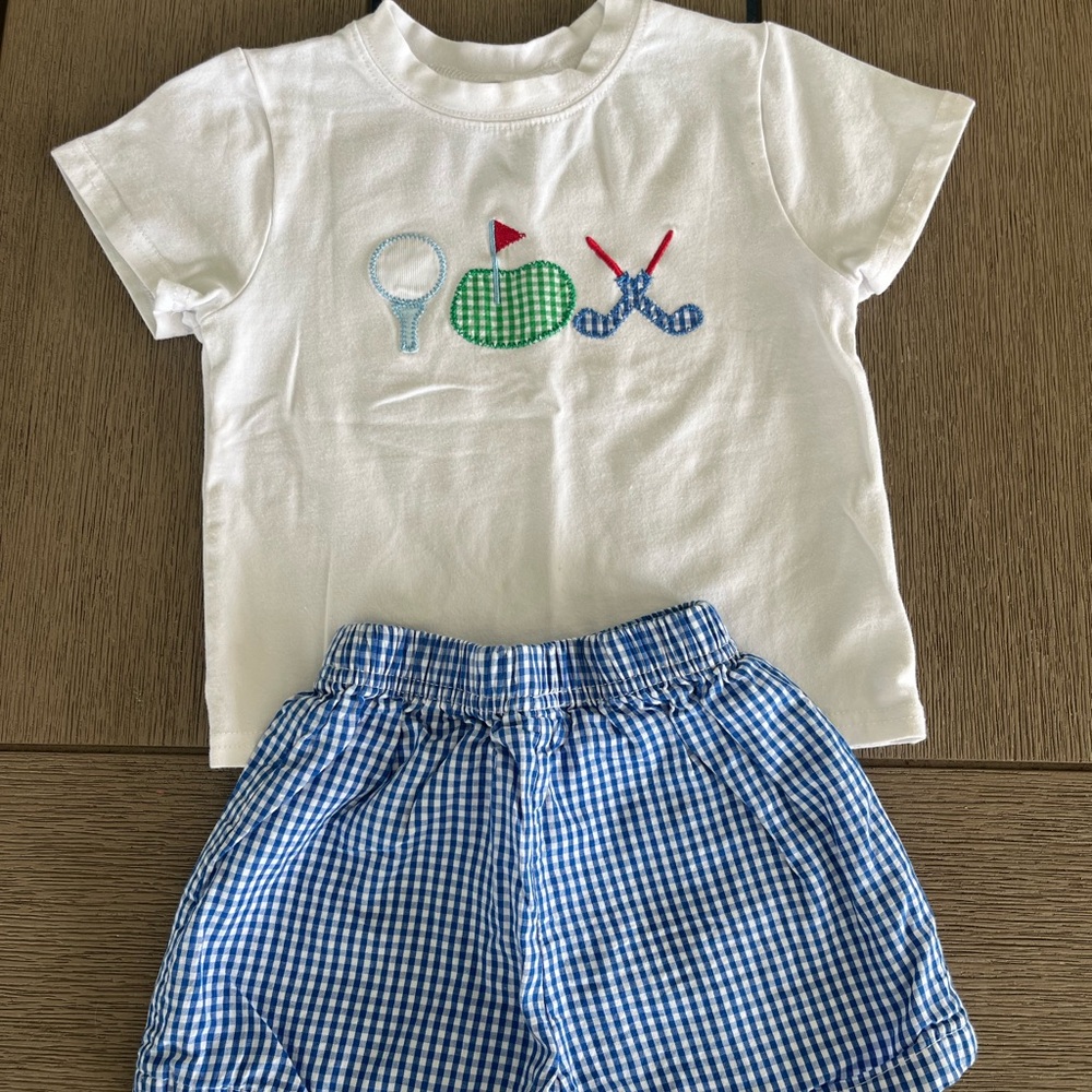 Embroidered Golf shirt and checkered shorts